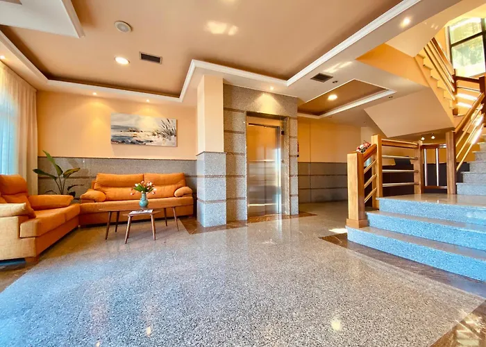 Отель Duerming Areas Playa Санхенхо